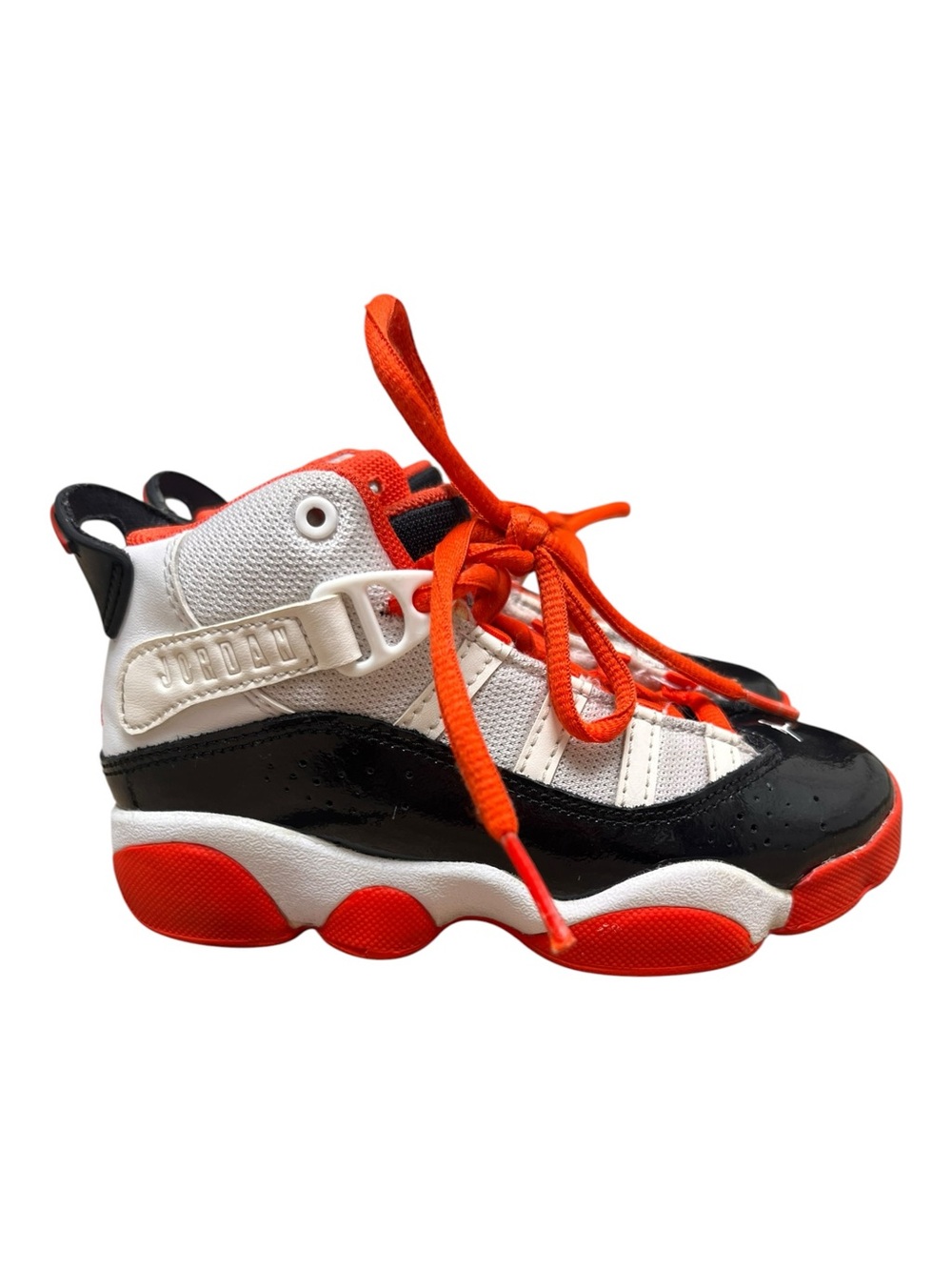 Kids Nike Jordan 6 Rings in the white, black, and Team Orange